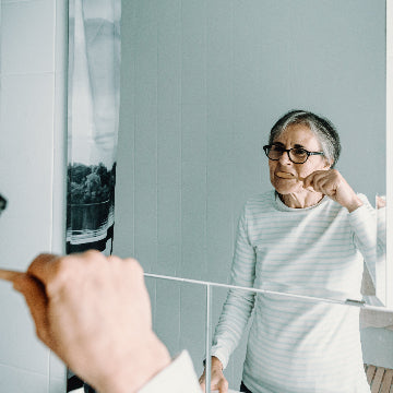 Woman brushing teeth